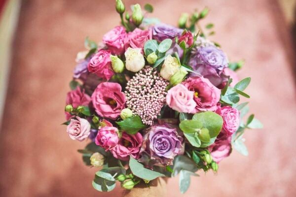 A beautiful well-arranged and wrapped bouquet of fresh flowers.